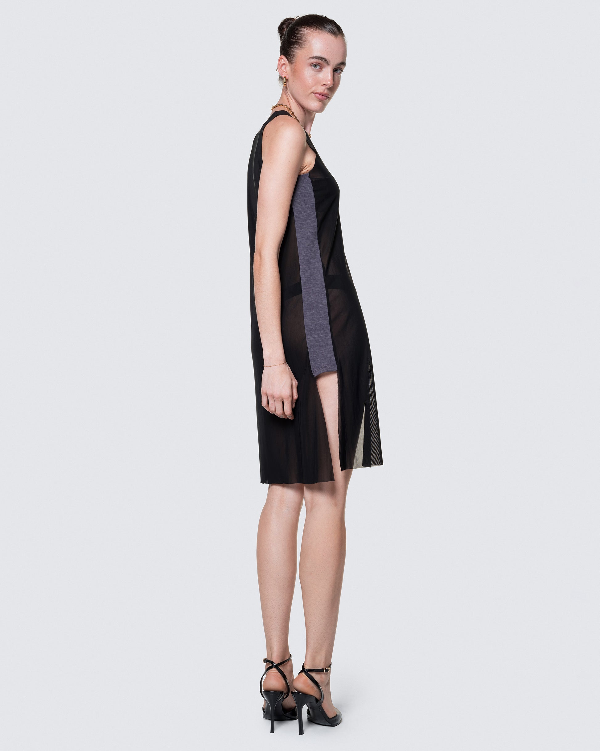 Fully body of side panel and flowy silhouette on 12Twelve’s Air Dress in Black