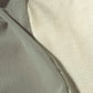 Close-up of sage green sheer fabric used in the lightweight Air Dress by 12Twelve