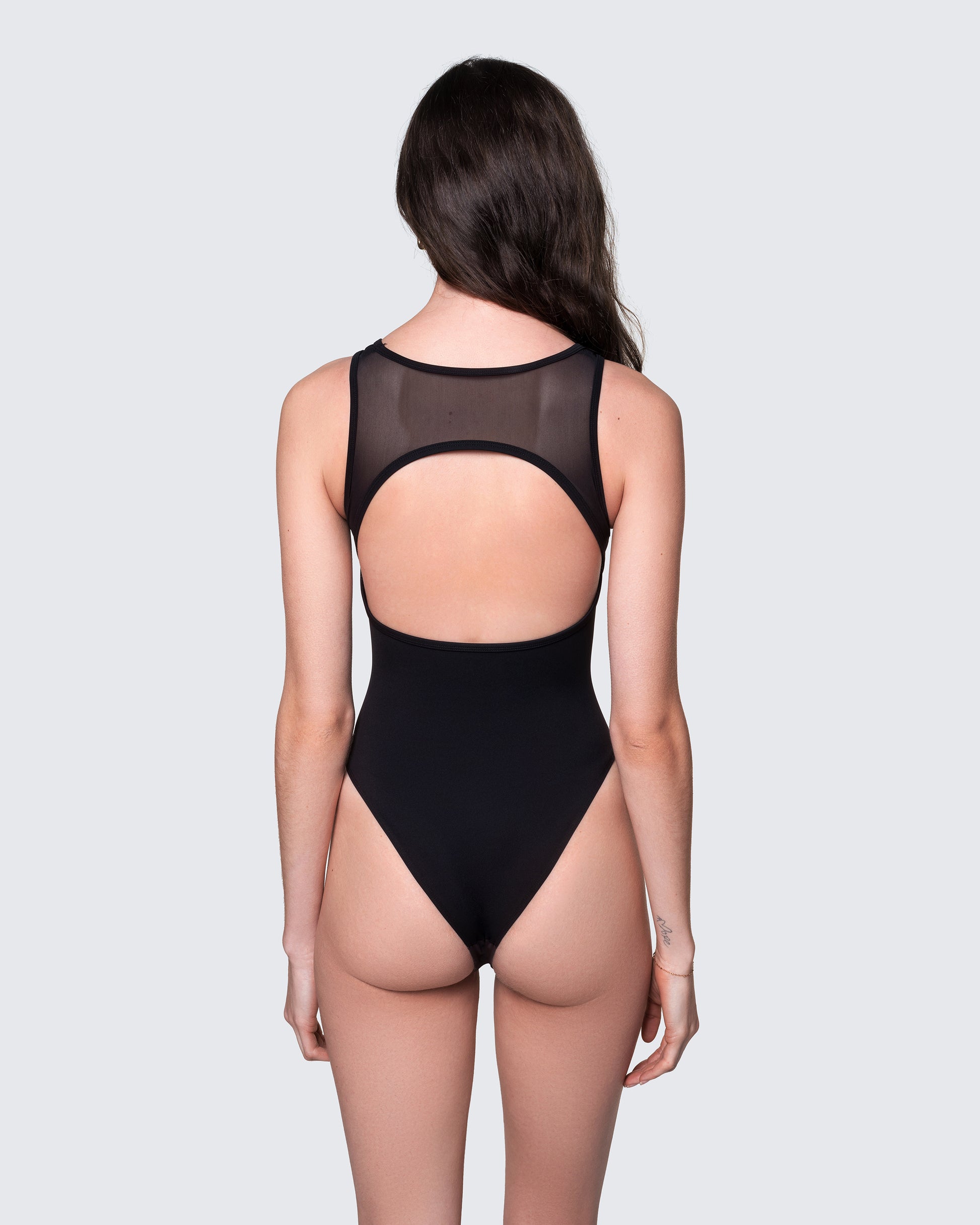 Back of 12Twelve bodysuit with racerback cut and circular mid-back opening