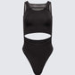 Flat lay of 12Twelve black bodysuit with cut-out waist and minimalist silhouette
