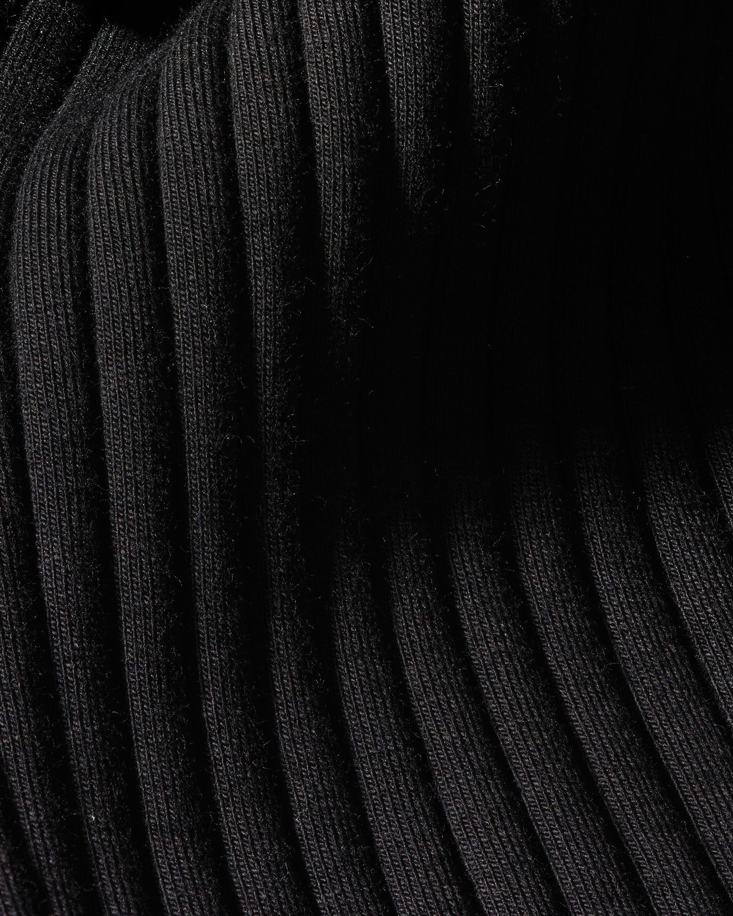 Close-up of ribbed black fabric used in Reversible Wrap Dress