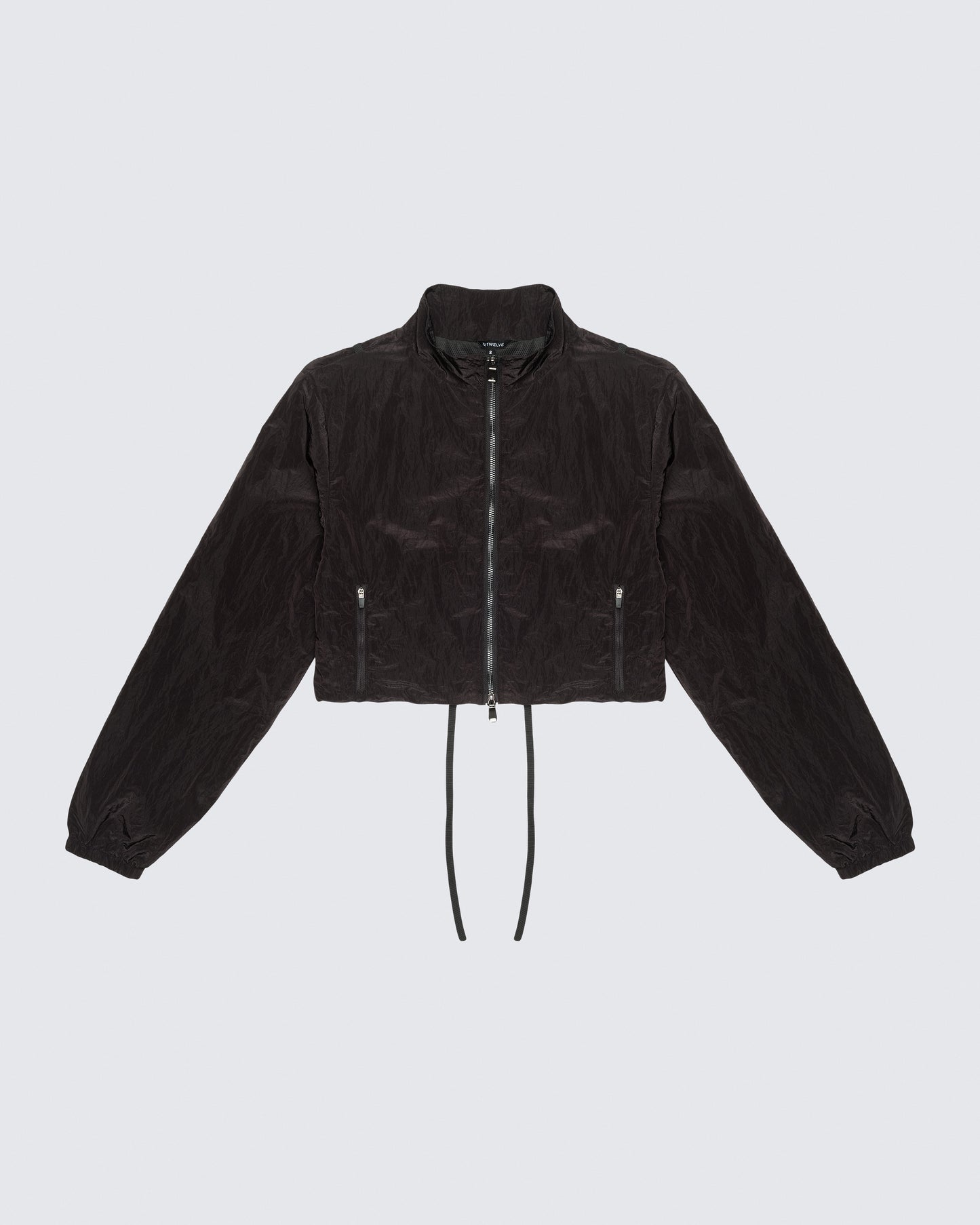Flat lay of 12Twelve black crop jacket with full sleeve, cropped length, and functional drawcords