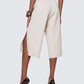 Back angle of the 12Twelve Ease Short in ivory showcasing relaxed drape and elastic waistband for comfortable fit