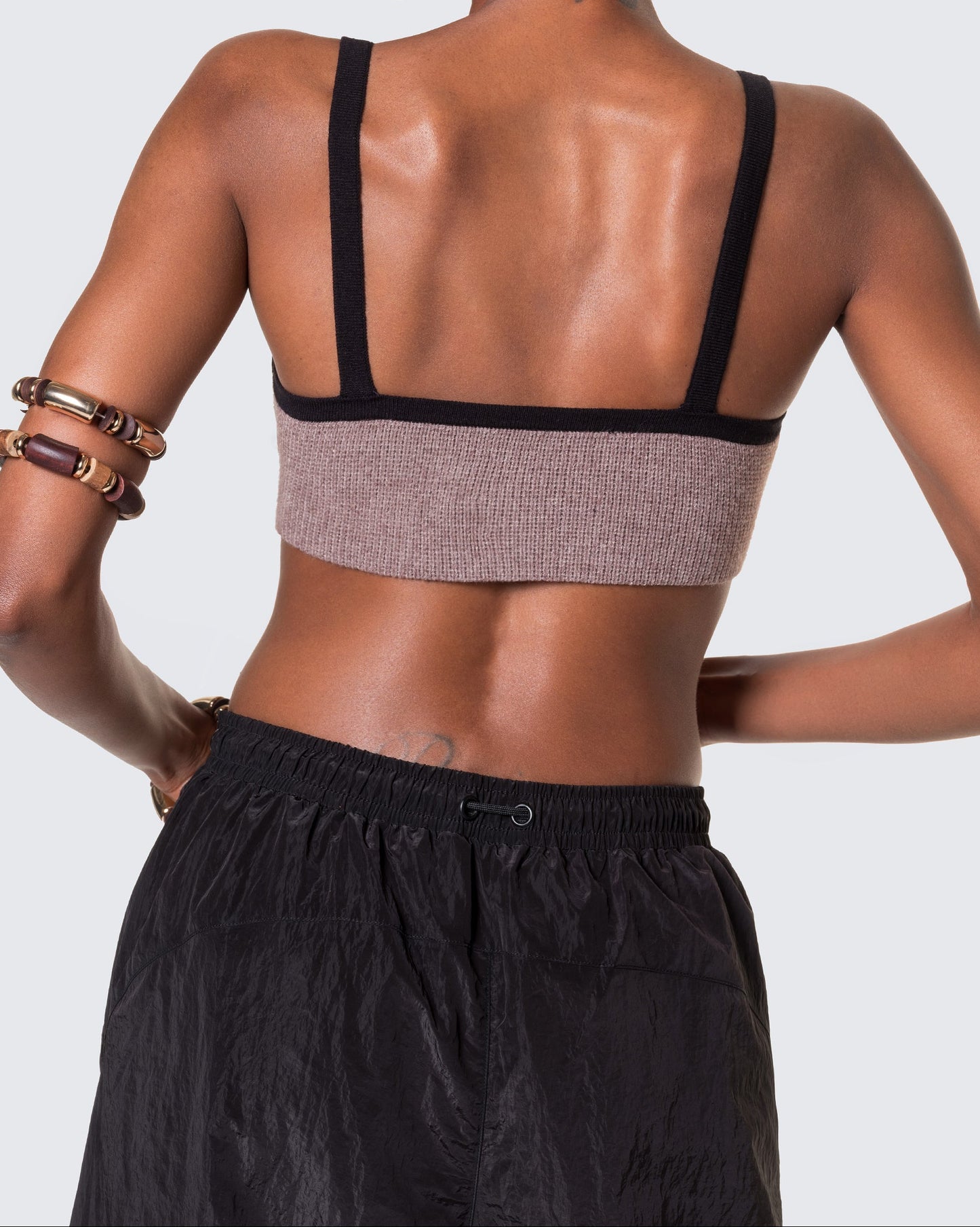 Back of Frame Knit by 12Twelve in Sienna Clay, featuring contrast trim and square cut