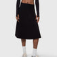 Black Heavenly Skirt styled with crop top, showing mid rise waist and swing shape