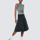 Model wearing 12Twelve Heavenly Skirt in emerald green paired with Tide Blue bodysuit