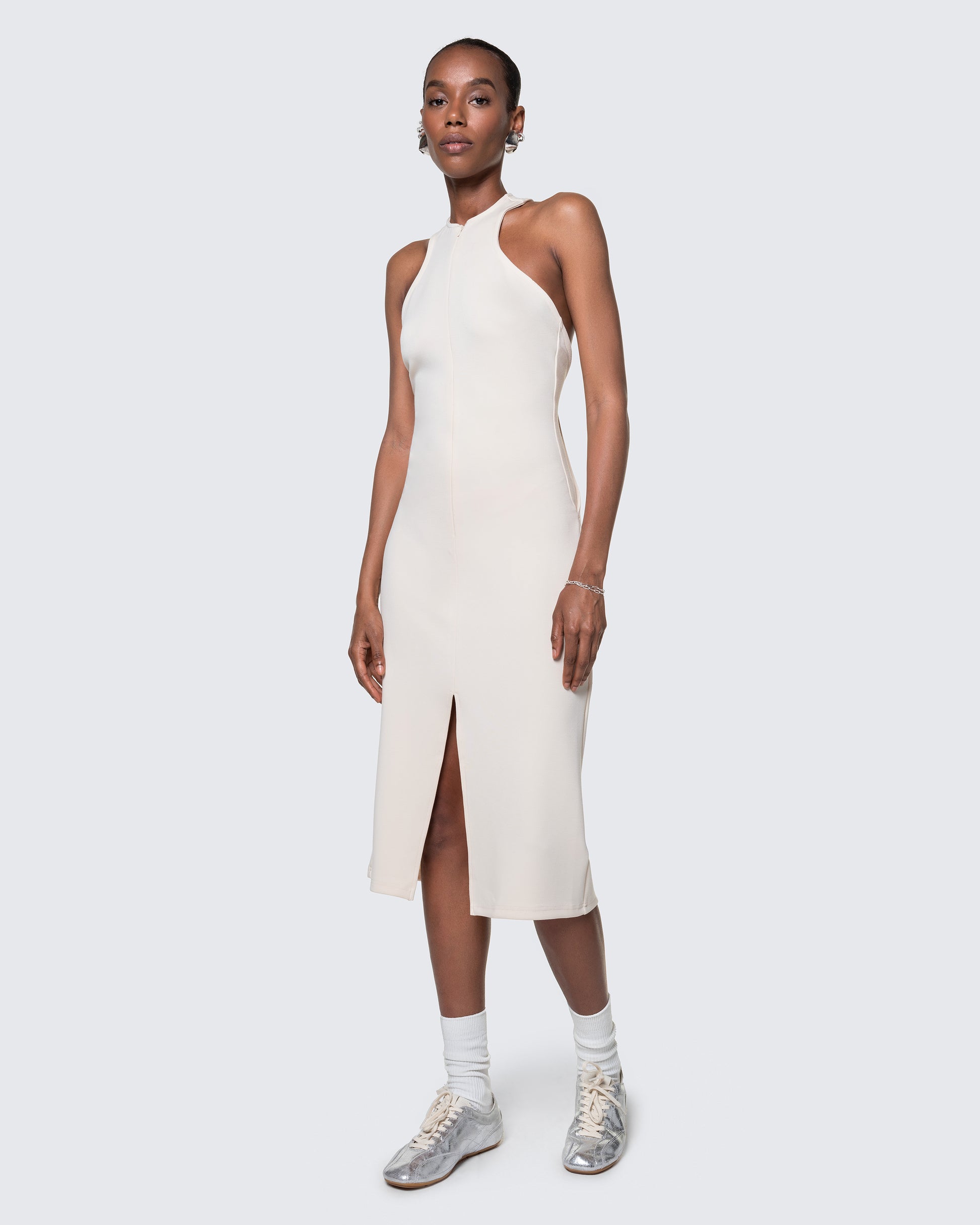 Full-length view of 12Twelve Form Dress styled with white socks and sneakers