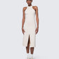 Model wearing 12Twelve Form Dress in ivory, featuring high neckline and center front slit