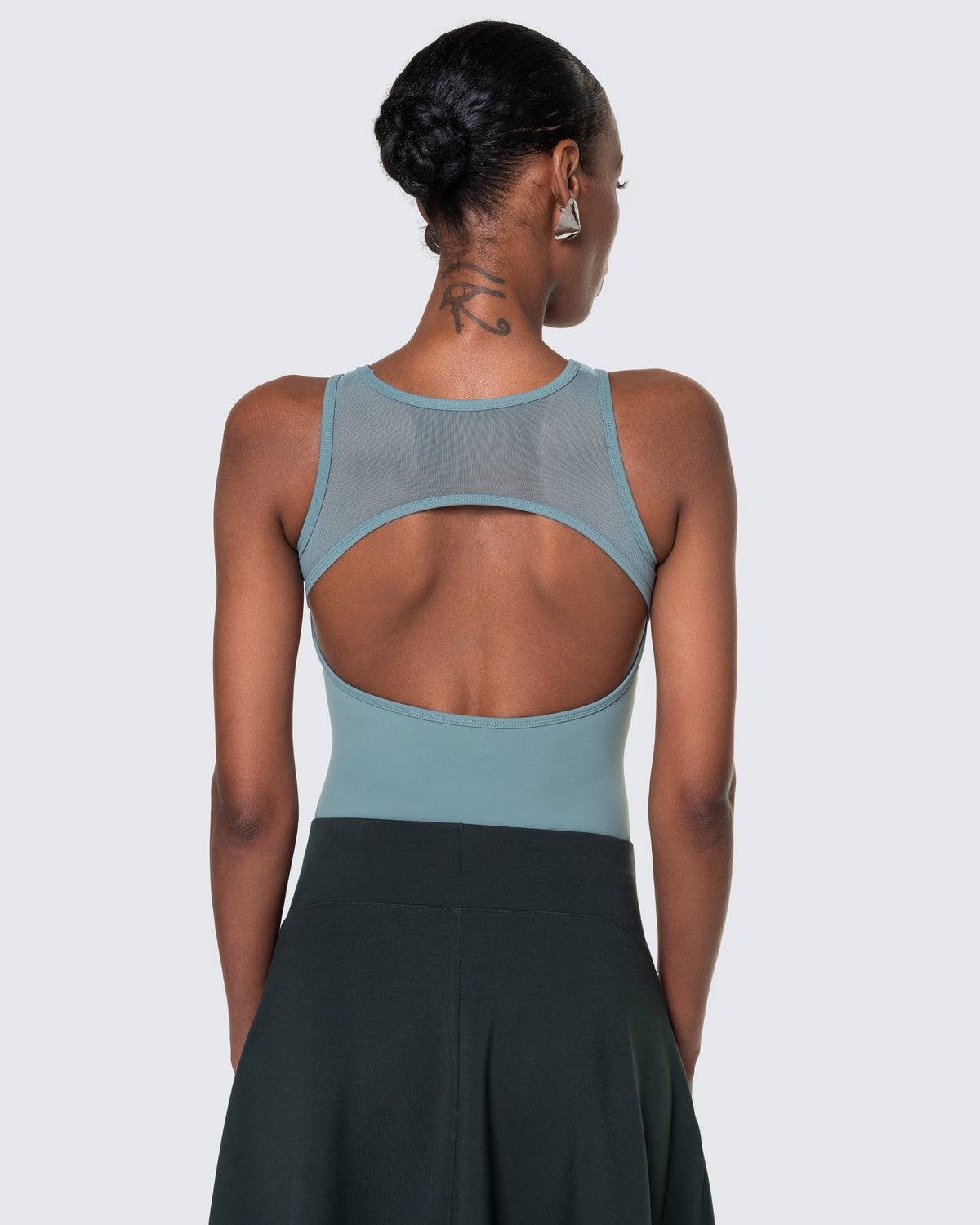 Back of 12Twelve bodysuit in tide blue with mesh and oval cut-out detail