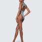 Side view of 12Twelve tide blue bodysuit featuring high-leg silhouette and stretch fit