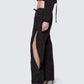 Side view of 12Twelve black track pants featuring curved adjustable slit and lightweight textured fabric
